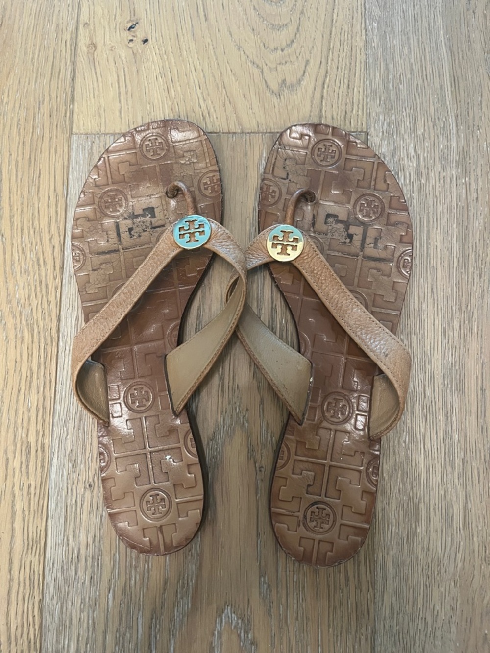 Tory Burch Tan/Bronze Leather Logo Flip Flops with Gold-Tone Medallions